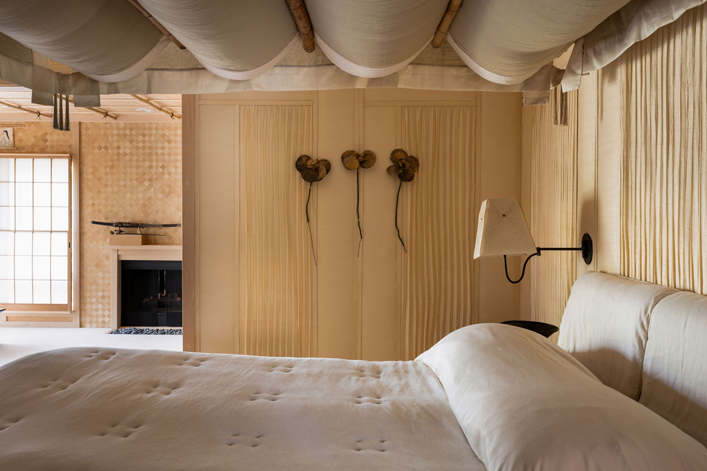 witness-locations-chalet-tournesol-idyllwild-japanese-bedroom-fabric-canopy-pleated-silk-walls-bronze-lotus