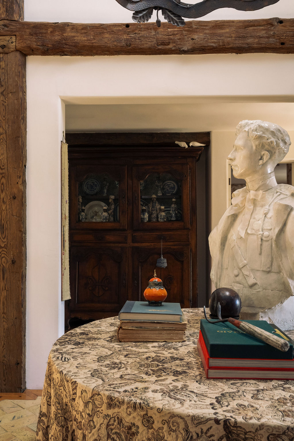 witness-locations-chalet-tournesol-idyllwild-library-hall-french-armoire-plaster-bust-detail